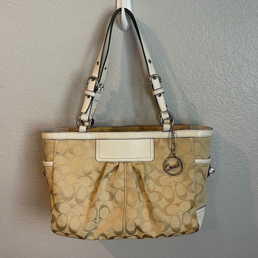 Tan and white Coach purse (medium size)